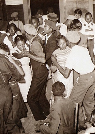 Jook Joint, Source: https://en.wikipedia.org/wiki/Blues_dance#/media/File:Jookjoint-dancing.jpg